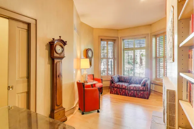 a view of a porch with wooden floor