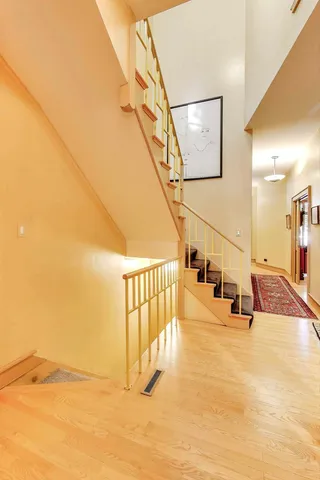 a view of a balcony with a tree