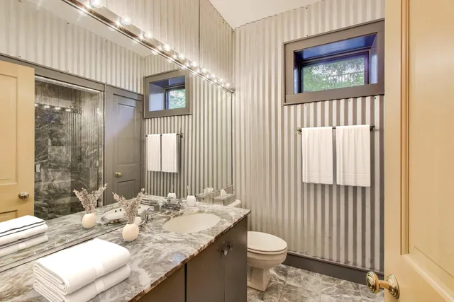 a bathroom with a bathtub and a sink