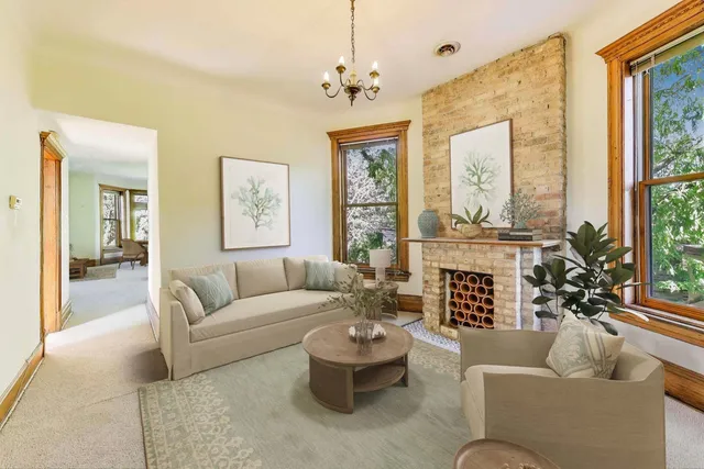 a view of a backyard with sitting area and furniture