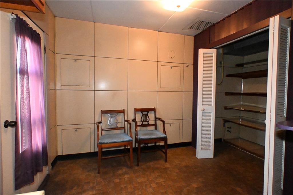 122 Taylor Run Road Monongahela, PA 15063 - Photo 11 of 31 a bedroom with a bed and a refrigerator