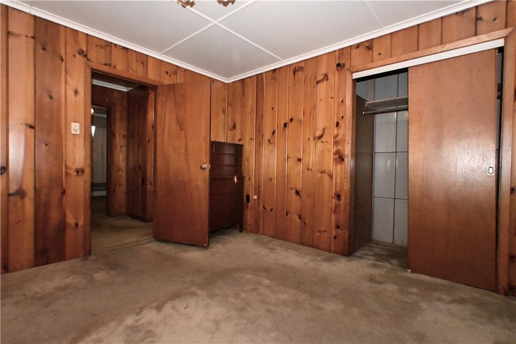 122 Taylor Run Road Monongahela, PA 15063 - Photo 18 of 34 a view of a hallway with wooden walls