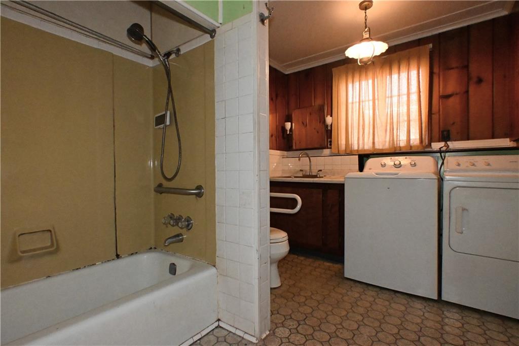 122 Taylor Run Road Monongahela, PA 15063 - Photo 19 of 31 a bathroom with a granite countertop sink a toilet and shower