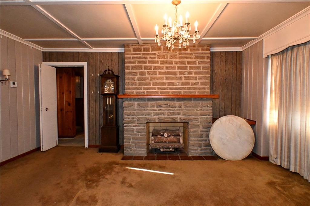 122 Taylor Run Road Monongahela, PA 15063 - Photo 7 of 31 a view of a livingroom with a fireplace and window