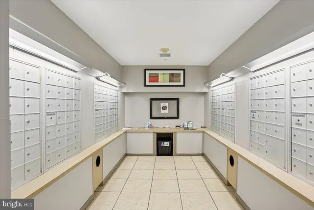 a kitchen with stainless steel appliances a sink and a cabinets