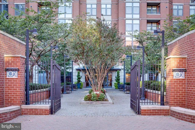 a front view of a building with garden