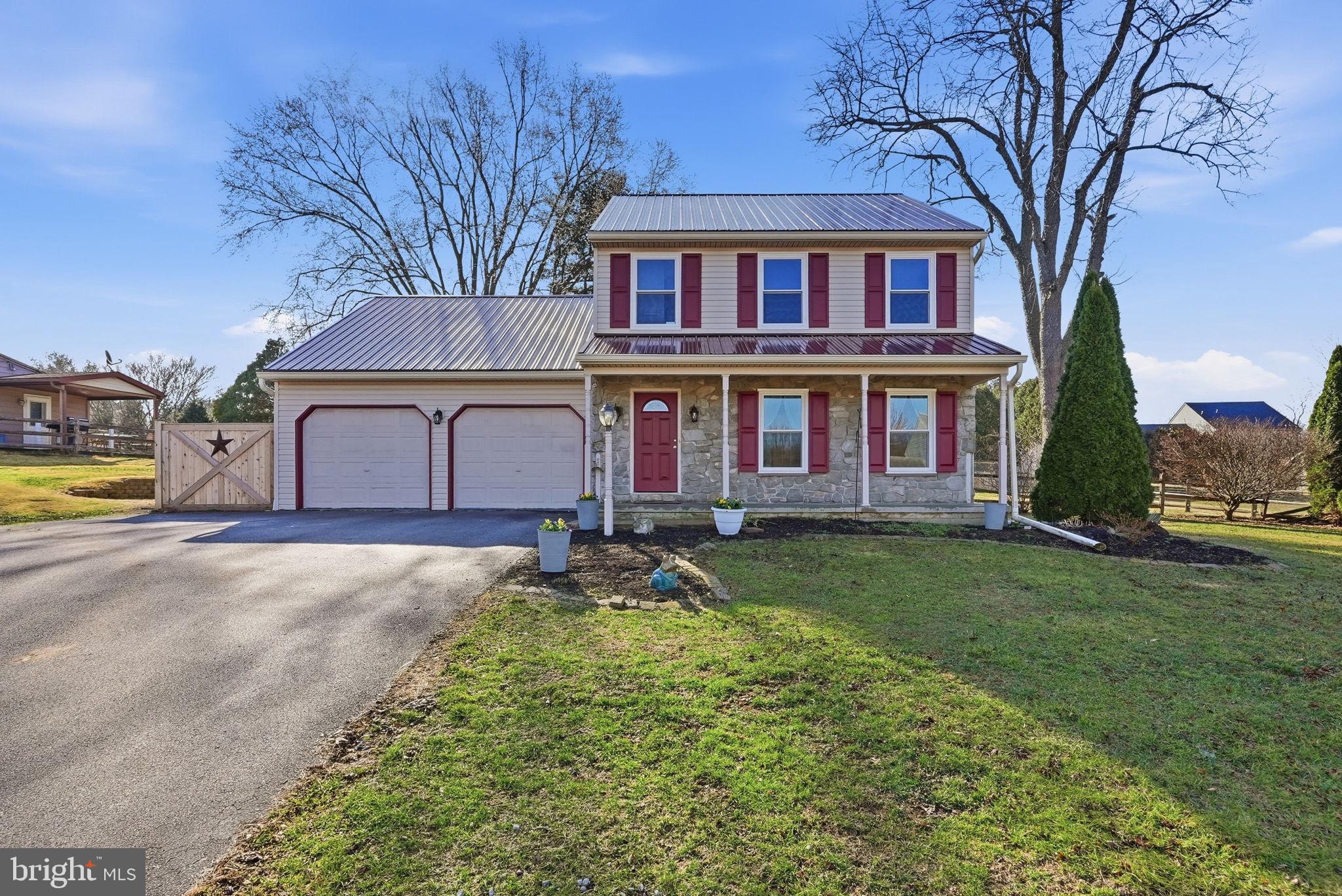824 Ridge Avenue Atglen, PA 19310 - Photo 1 of 1 a front view of a house with garden