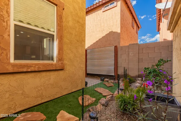 a view of a door and chair in the room