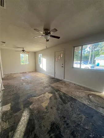 a view of a big room with carpet