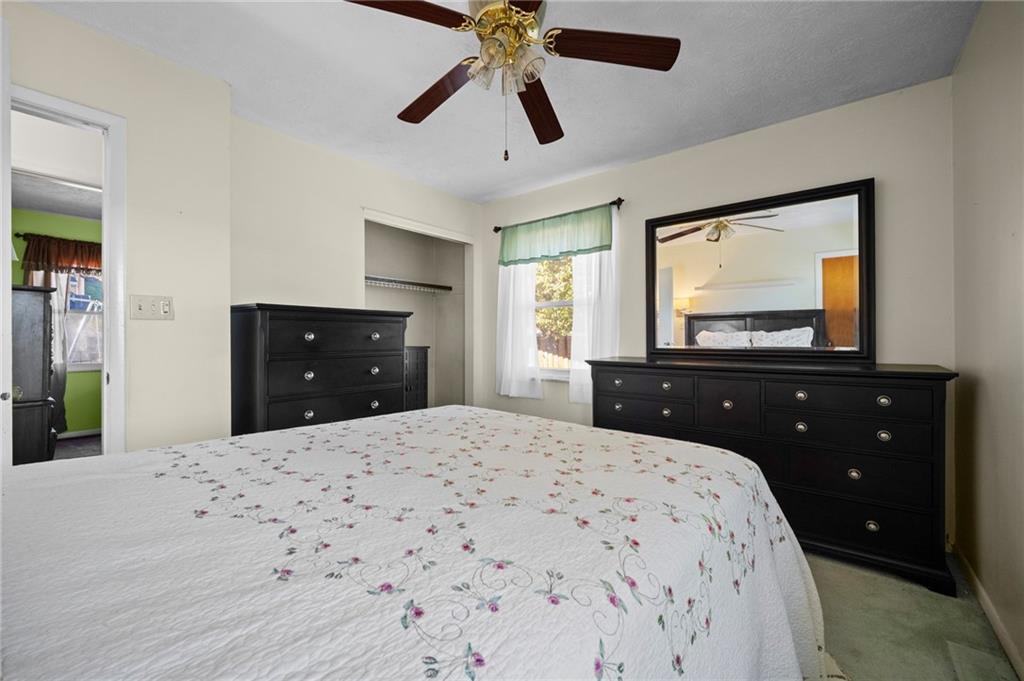 1213 Corrin Avenue Monongahela, PA 15063 - Photo 15 of 41 a bedroom with a bed and a flat screen tv