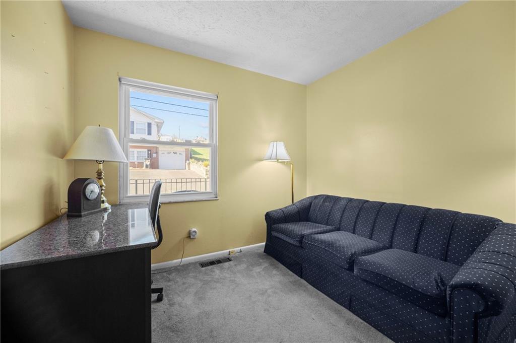 1213 Corrin Avenue Monongahela, PA 15063 - Photo 21 of 41 a living room with furniture and a window