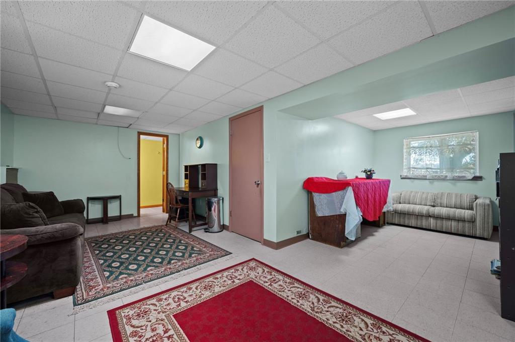 1213 Corrin Avenue Monongahela, PA 15063 - Photo 24 of 41 a living room with furniture and a rug