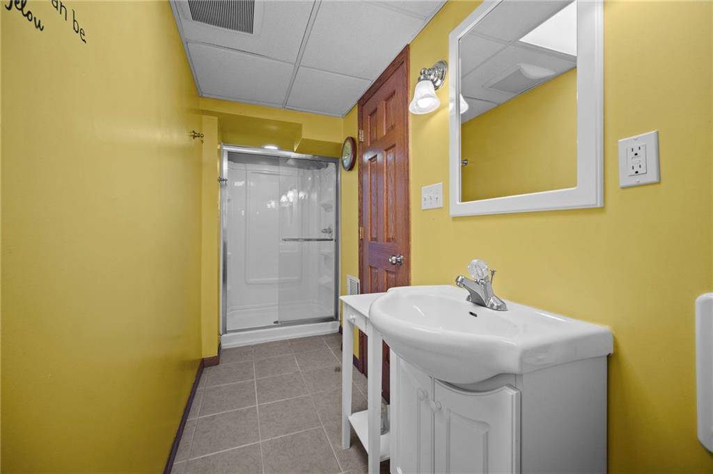 1213 Corrin Avenue Monongahela, PA 15063 - Photo 26 of 41 a bathroom with a sink and a mirror