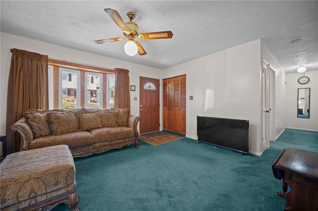 1213 Corrin Avenue Monongahela, PA 15063 - Photo 4 of 41 a living room with furniture and a large window