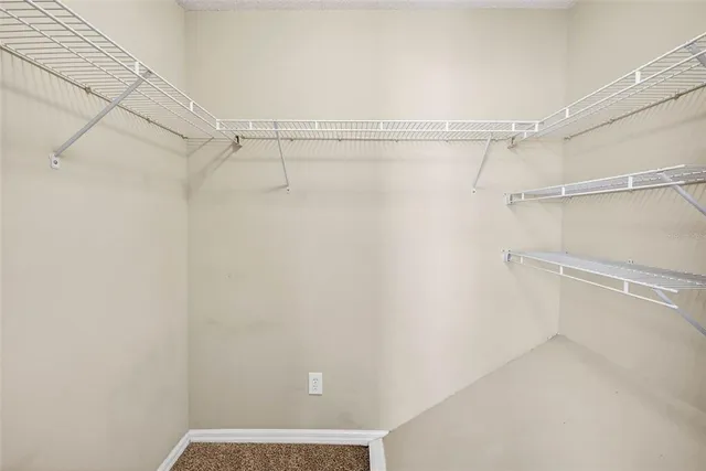 a view of a room with racks on the wall