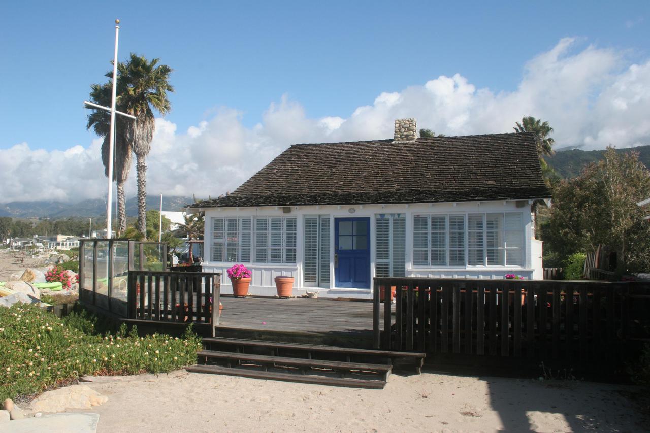 a front view of a house with a porch