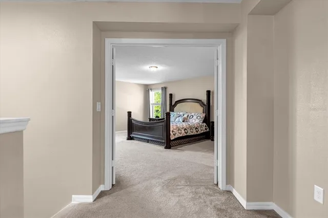 a view of a livingroom and car parked