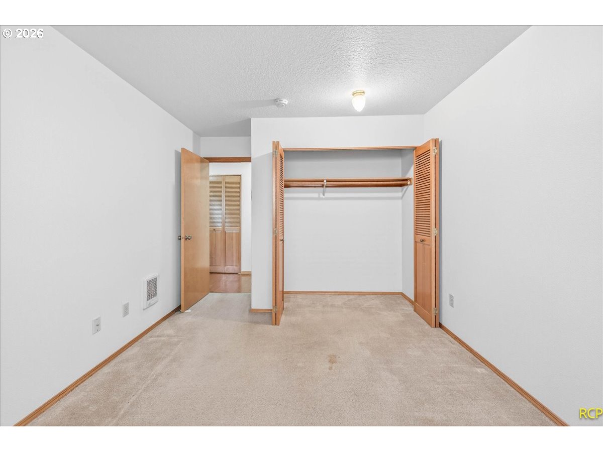 16444 Southwest 130th Terrace, Unit 121 Portland, OR 97224 - Photo 25 of 40 a view of an empty room