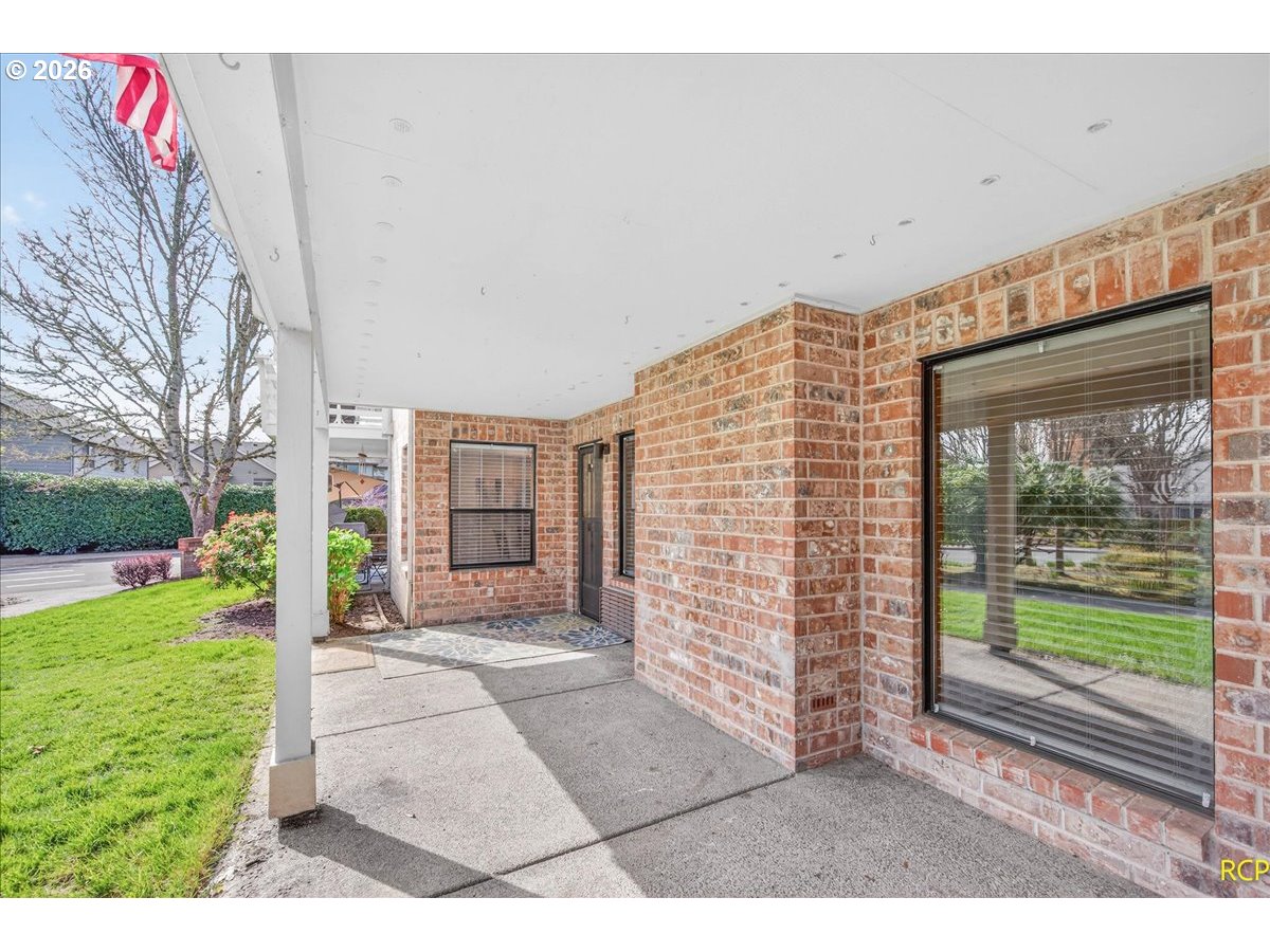 16444 Southwest 130th Terrace, Unit 121 Portland, OR 97224 - Photo 5 of 40 a view of a porch