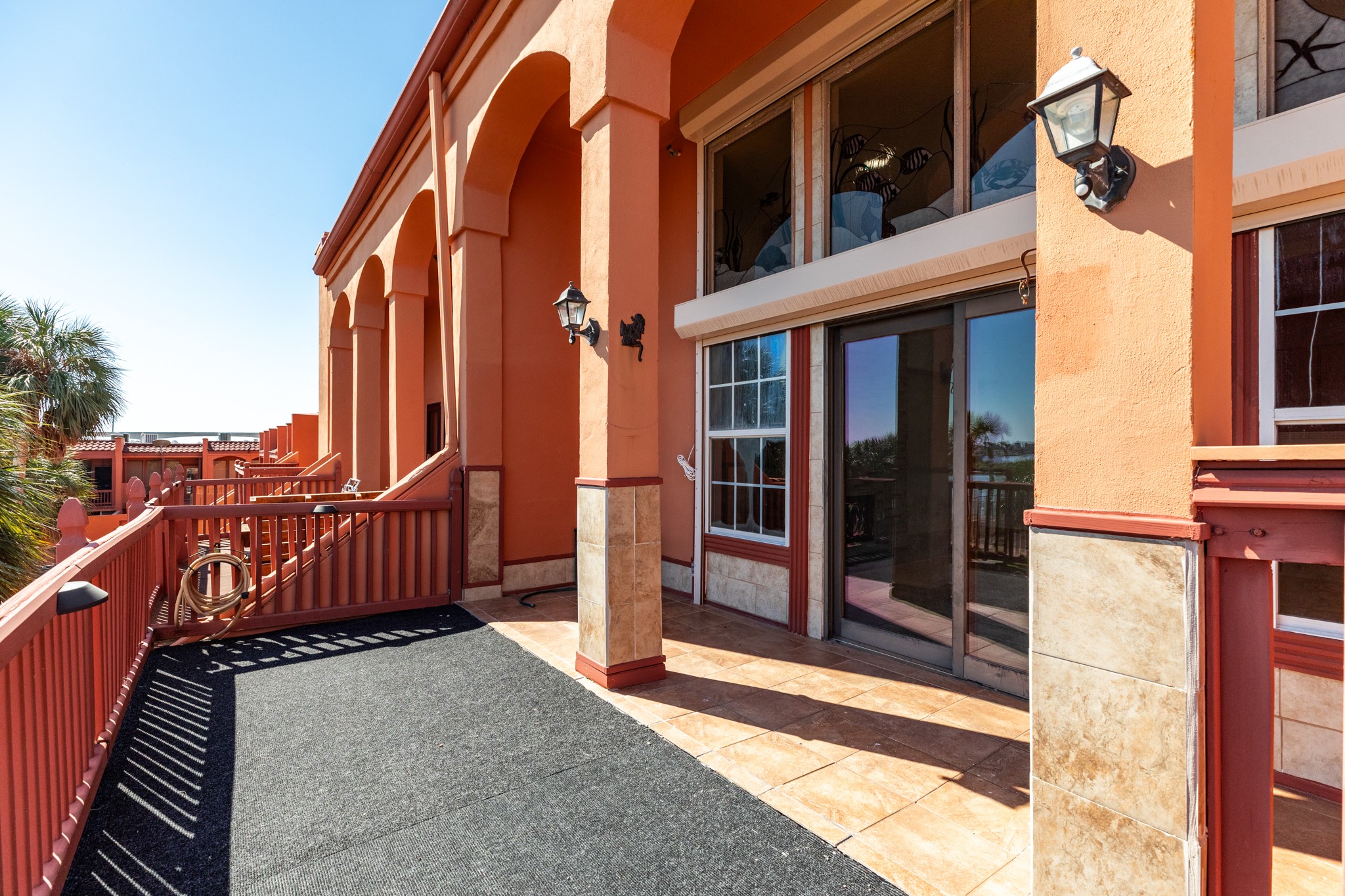 411 Sailfish Lane, Unit 101 Freeport, TX 77541 - Photo 17 of 46 a view of a house with a large windows