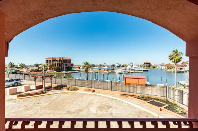 a view of a balcony with an ocean