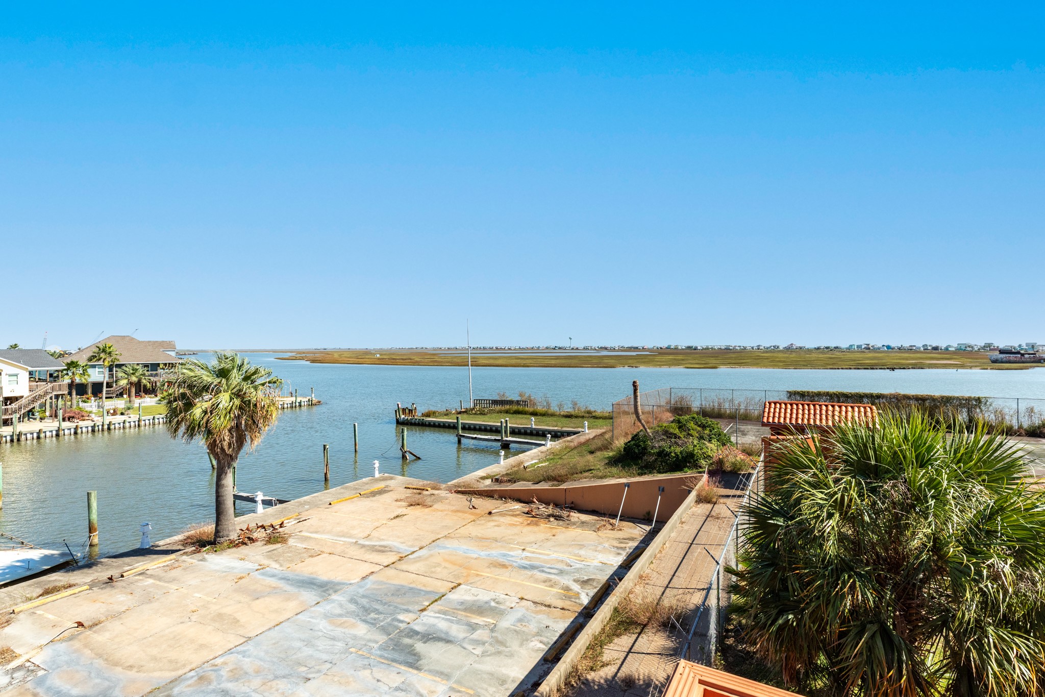 411 Sailfish Lane, Unit 101 Freeport, TX 77541 - Photo 19 of 46 a view of a balcony with an ocean