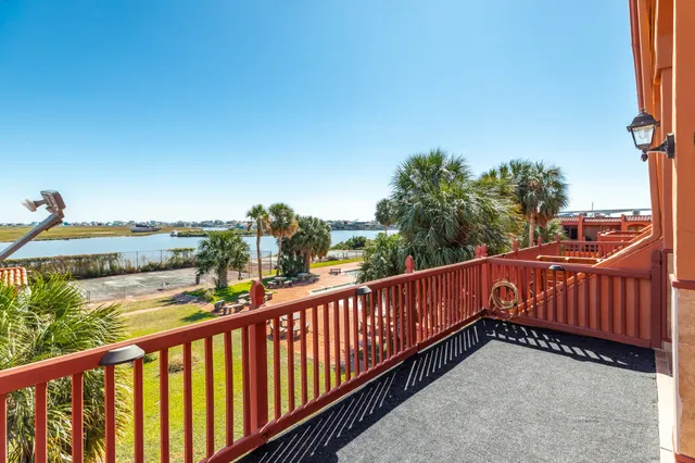 a view of a balcony with an outdoor space