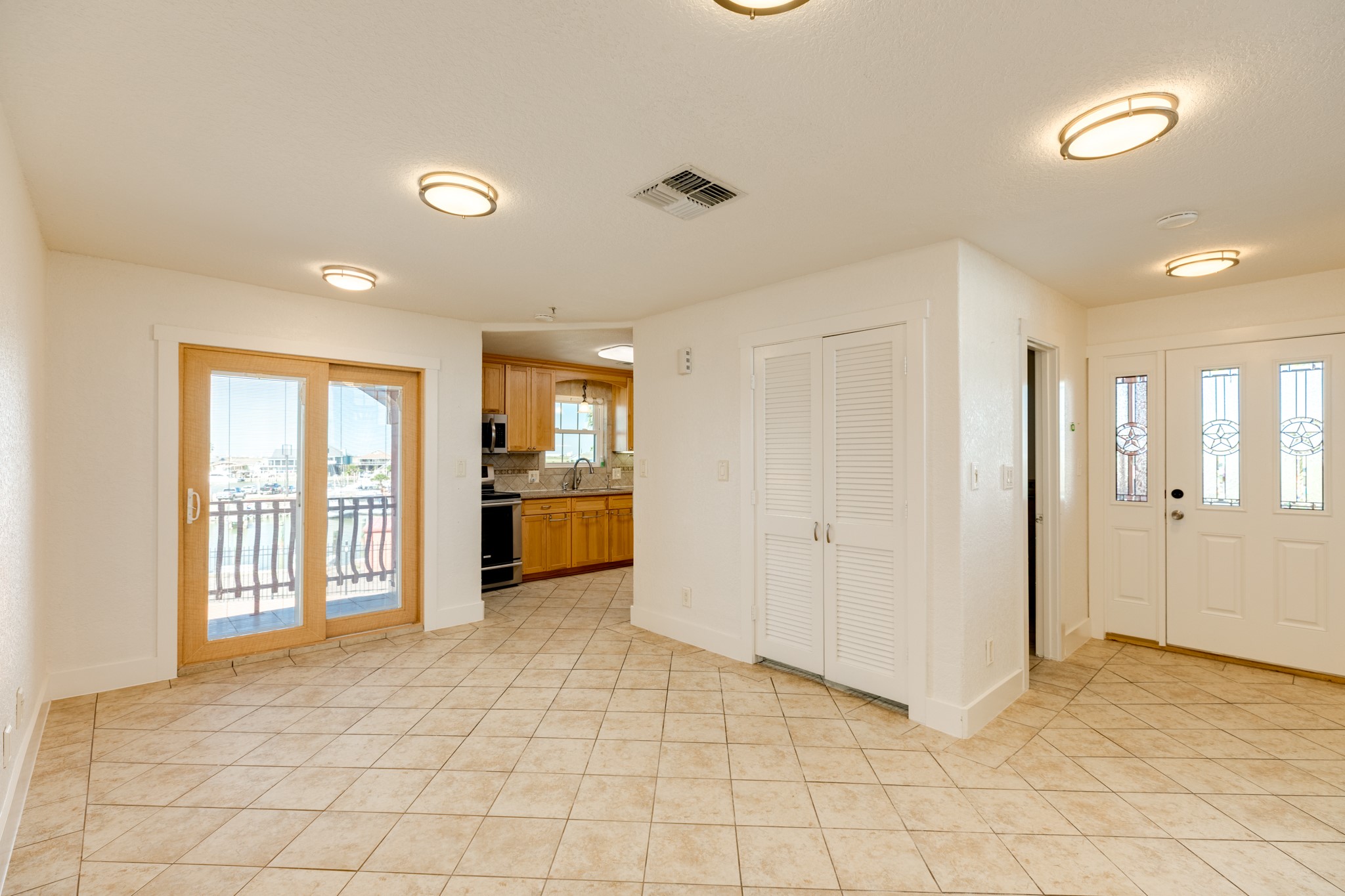 411 Sailfish Lane, Unit 101 Freeport, TX 77541 - Photo 23 of 46 a view of an empty room and a window