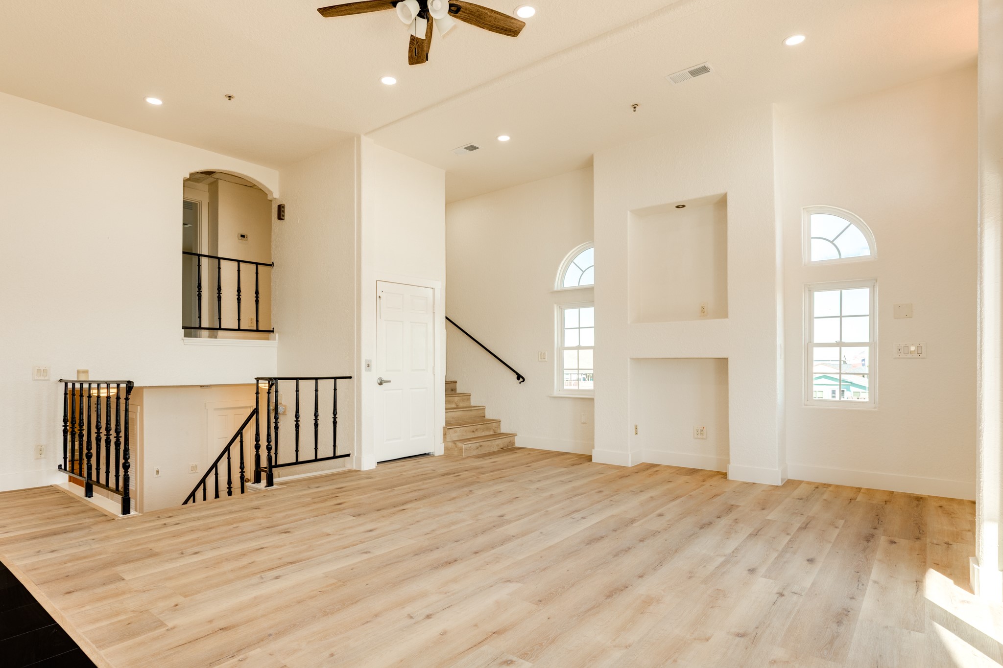 411 Sailfish Lane, Unit 101 Freeport, TX 77541 - Photo 28 of 46 a view of empty room with wooden floor and fan