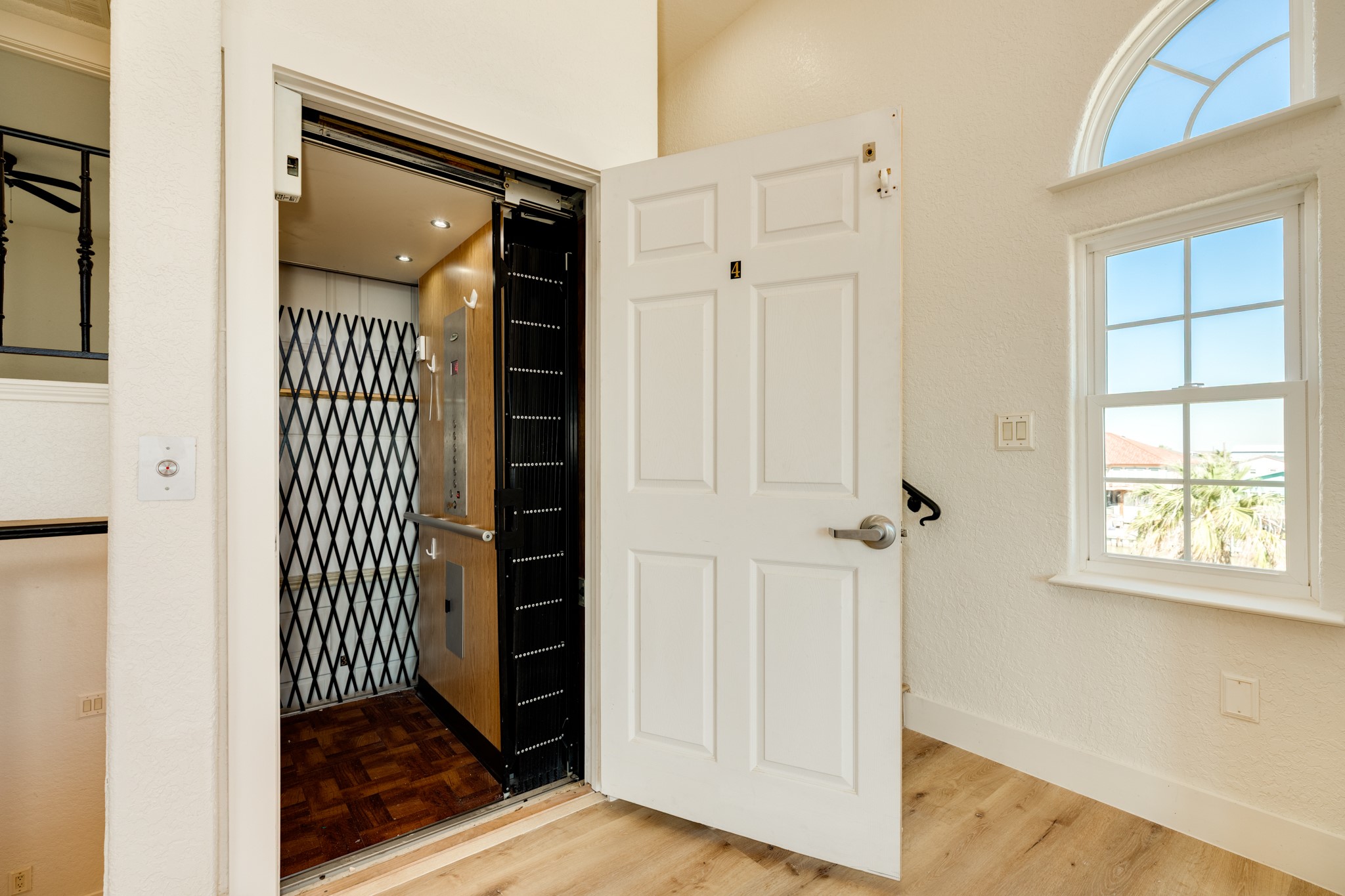 411 Sailfish Lane, Unit 101 Freeport, TX 77541 - Photo 30 of 46 a view of a livingroom with wooden floor and a window