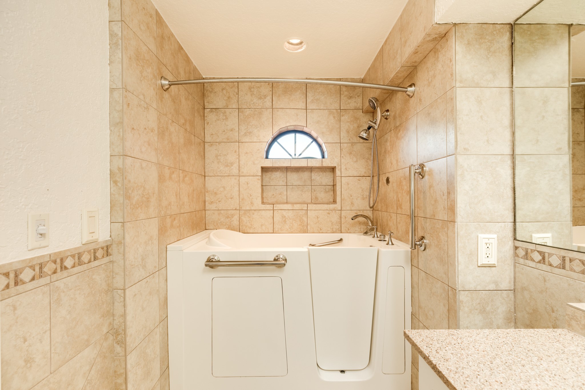 411 Sailfish Lane, Unit 101 Freeport, TX 77541 - Photo 37 of 46 a bathroom with a sink mirror toilet and shower
