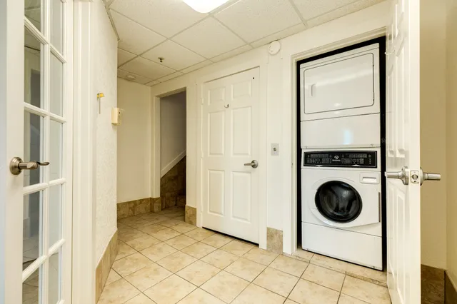 a view of swimming pool with outdoor seating and trees