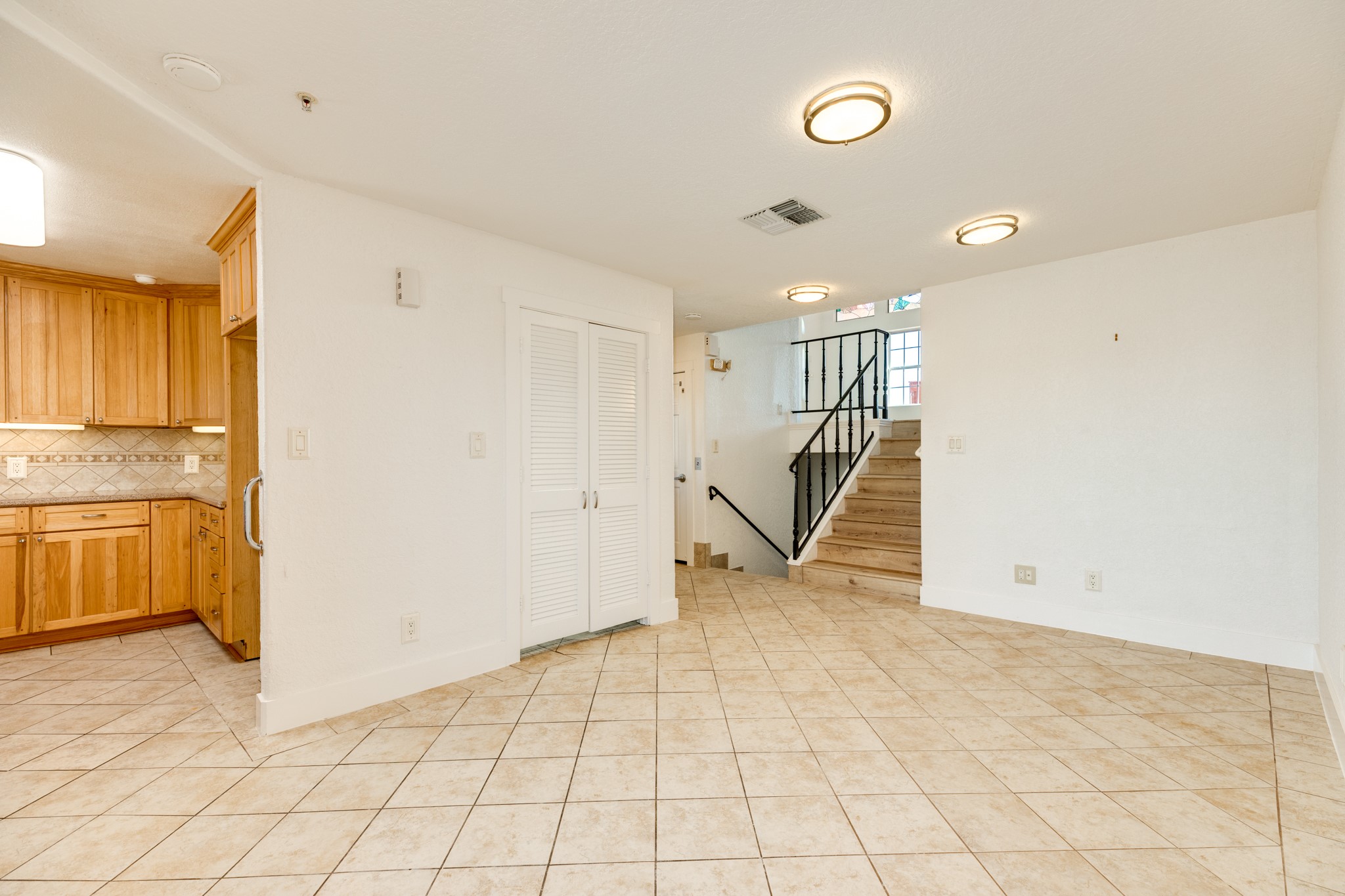 411 Sailfish Lane, Unit 101 Freeport, TX 77541 - Photo 5 of 46 a view of an empty room with wooden floor