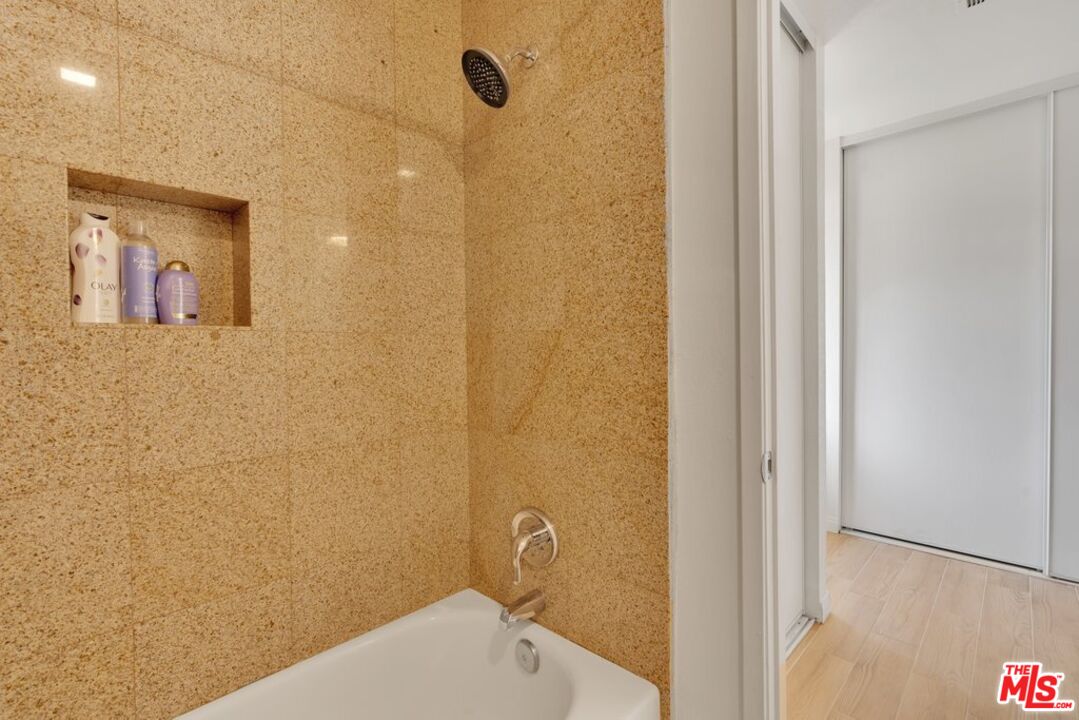 48255 Monroe Street, Unit 56 Indio, CA 92201 - Photo 16 of 30 a bathroom with a shower and a sink