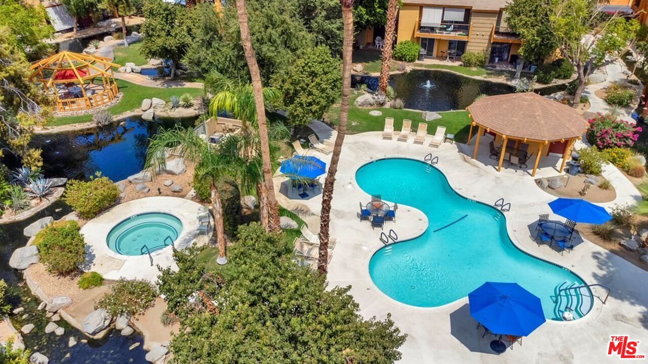 48255 Monroe Street, Unit 56 Indio, CA 92201 - Photo 29 of 30 an aerial view of a swimming pool