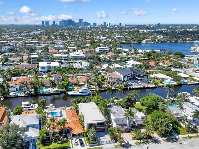 an aerial view of multiple houses with outdoor space