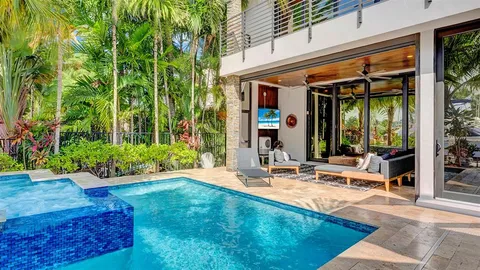 a kitchen with counter top space and stainless steel appliances