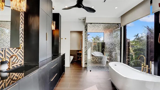 a view of a patio with swimming pool table and chairs