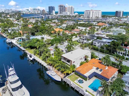 a view of a house with basketball court