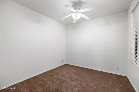 a view of entryway with stairs and white door