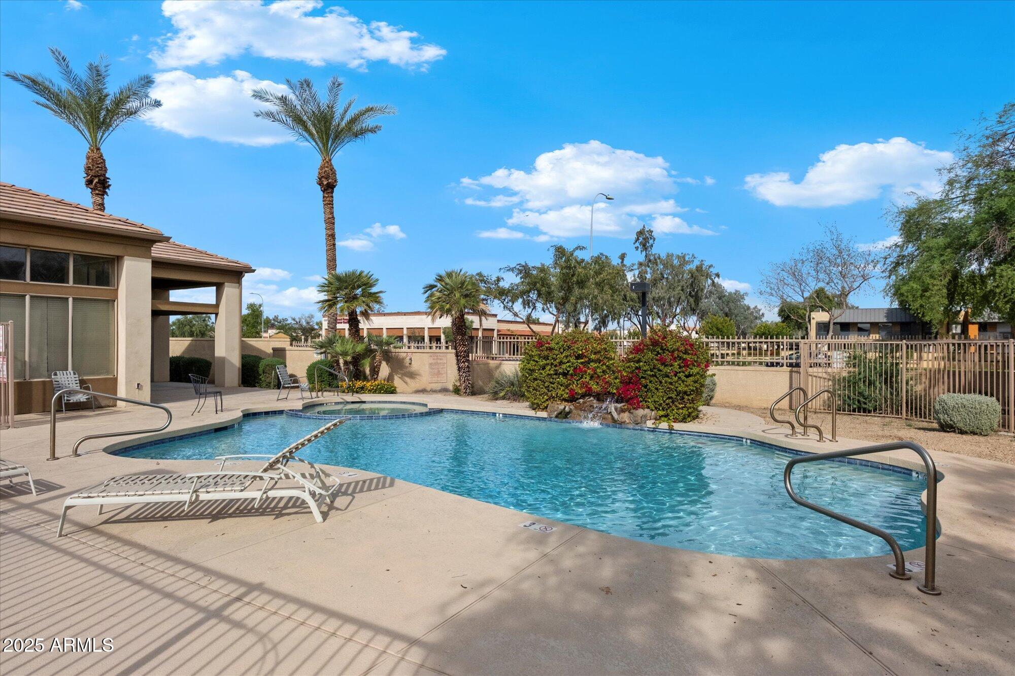 1445 East Broadway Road, Unit 120 Tempe, AZ 85282 - Photo 25 of 39 a view of a house with swimming pool and sitting area