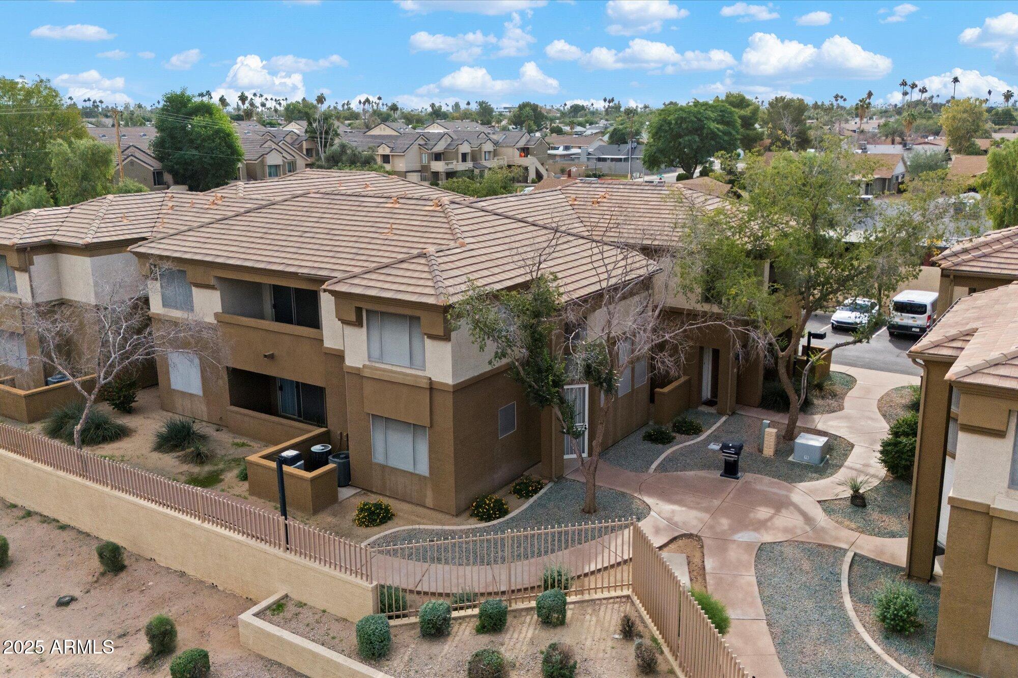 1445 East Broadway Road, Unit 120 Tempe, AZ 85282 - Photo 29 of 39 a view of a house with sitting area and furniture
