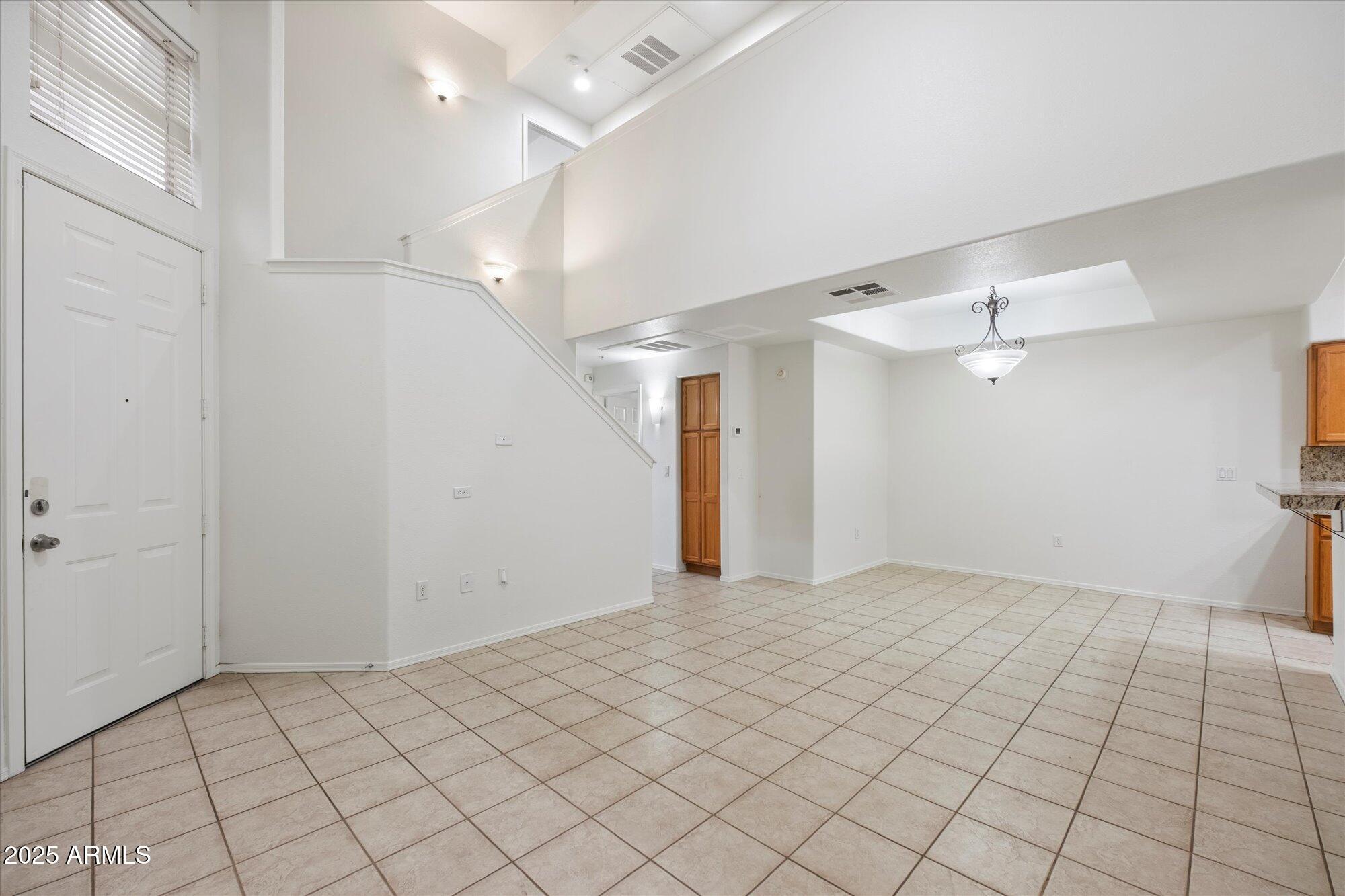 1445 East Broadway Road, Unit 120 Tempe, AZ 85282 - Photo 4 of 39 a view of an empty room