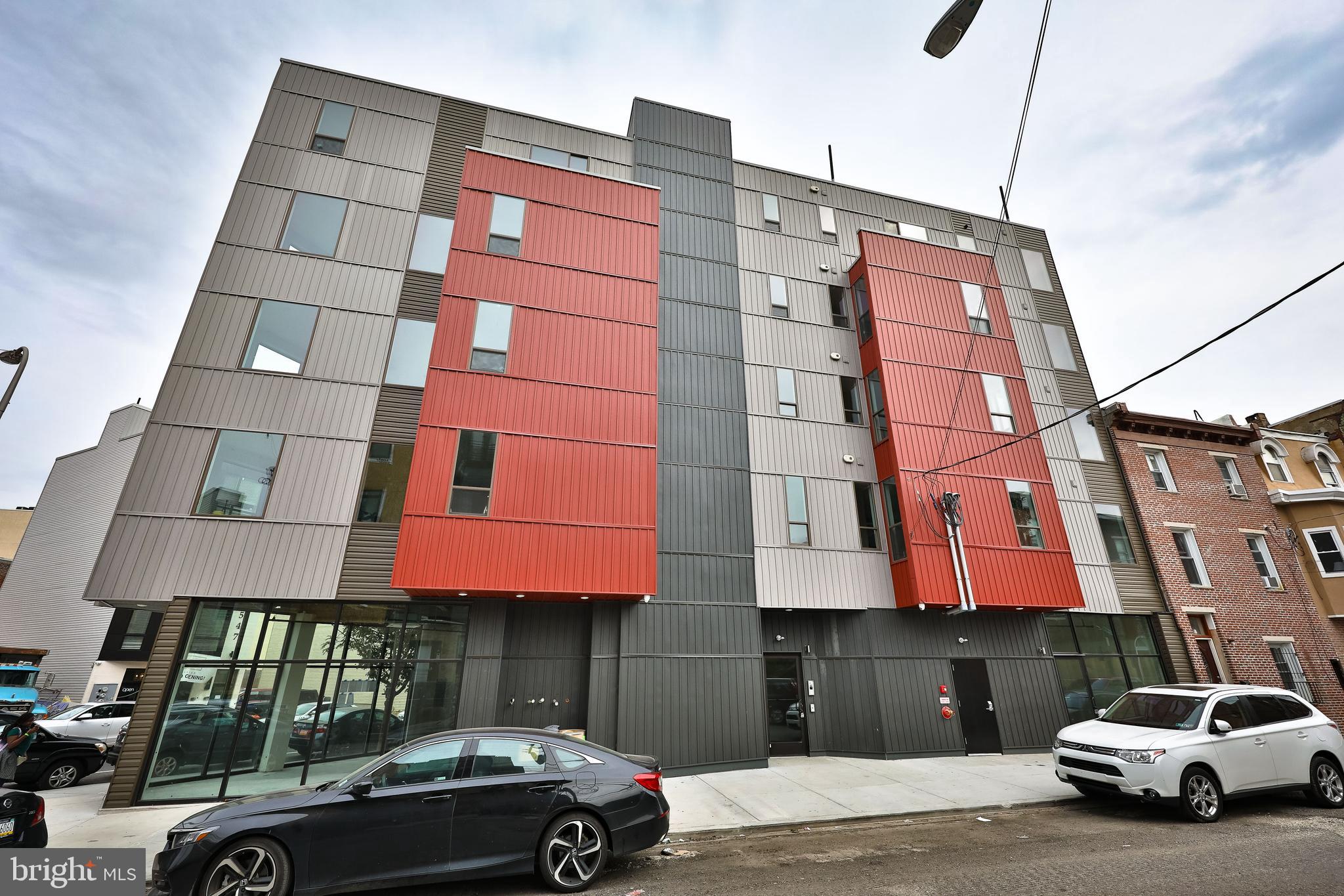 1540-42 Ridge Avenue, Unit 2S Philadelphia, PA 19130 - Photo 18 of 20 a car parked in front of a building