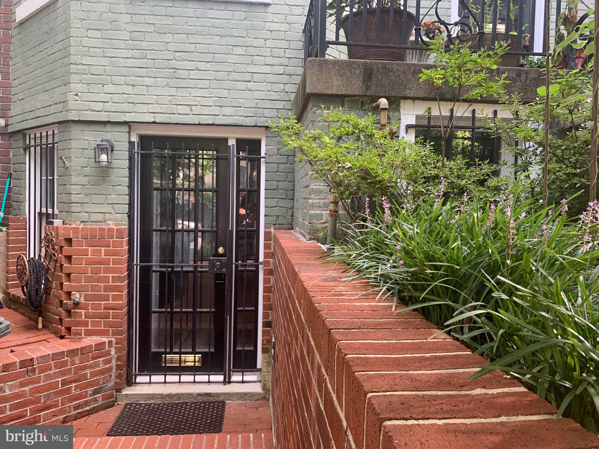 643 E Street Northeast Washington, DC 20002 - Photo 14 of 59 a view of a pathway with a house