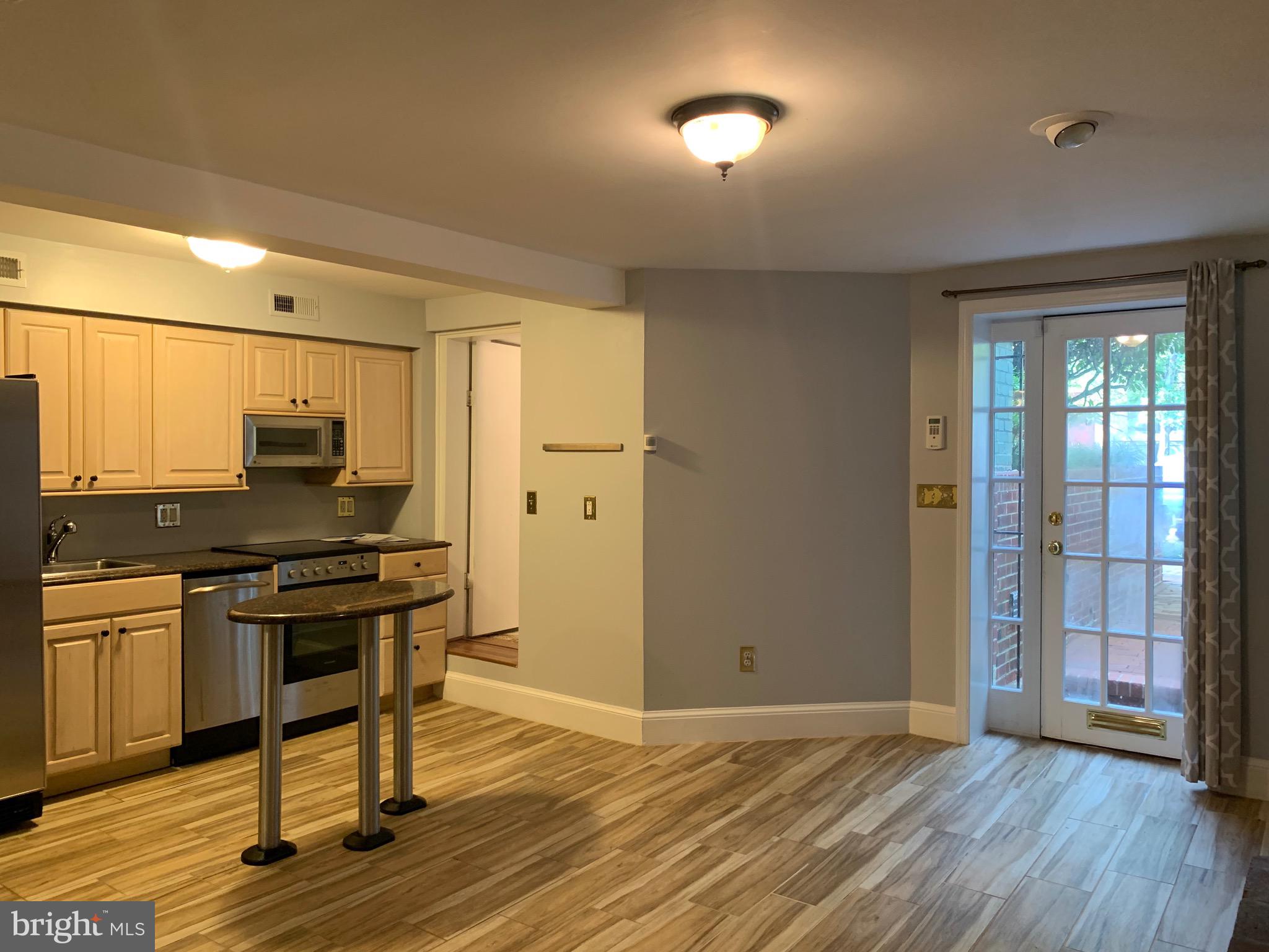 643 E Street Northeast Washington, DC 20002 - Photo 2 of 59 a view of a room with wooden floor and furniture