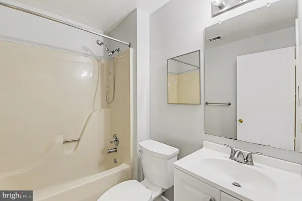 an empty room with a empty space and window