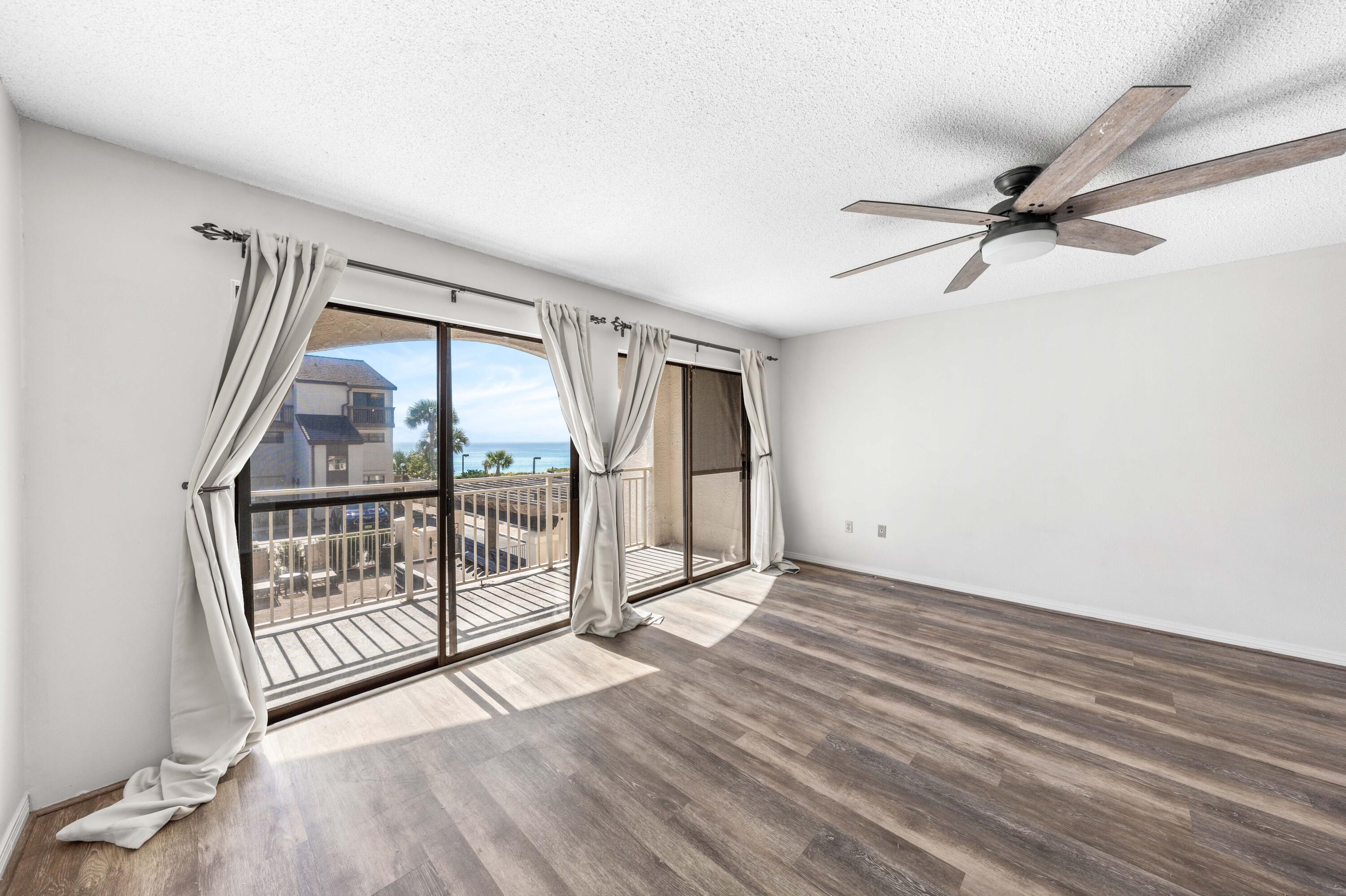 3654 East County Highway 30A, Unit 8B Santa Rosa Beach, FL 32459 - Photo 13 of 42 a view of an empty room with a window