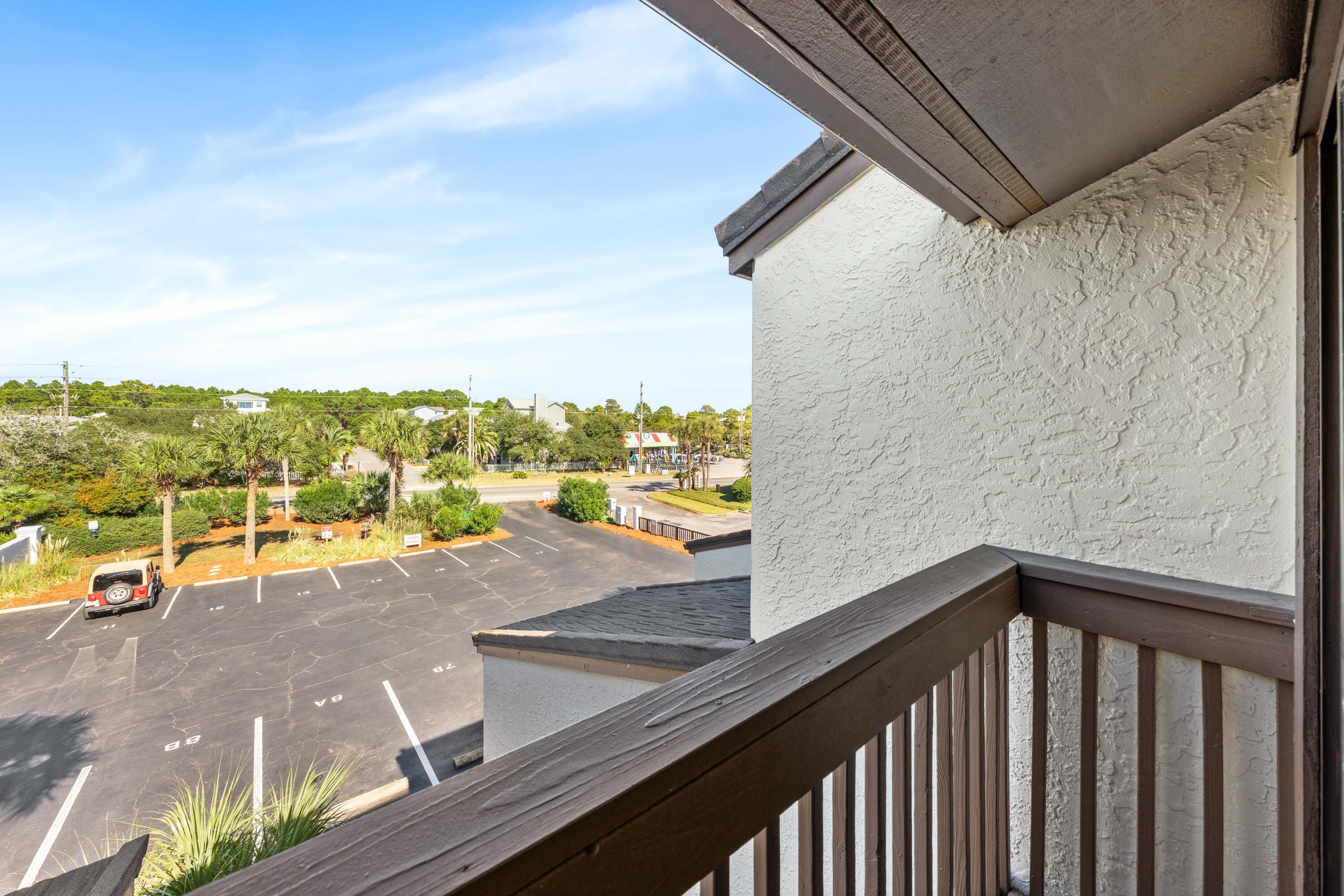3654 East County Highway 30A, Unit 8B Santa Rosa Beach, FL 32459 - Photo 20 of 42 a view of a balcony with city view