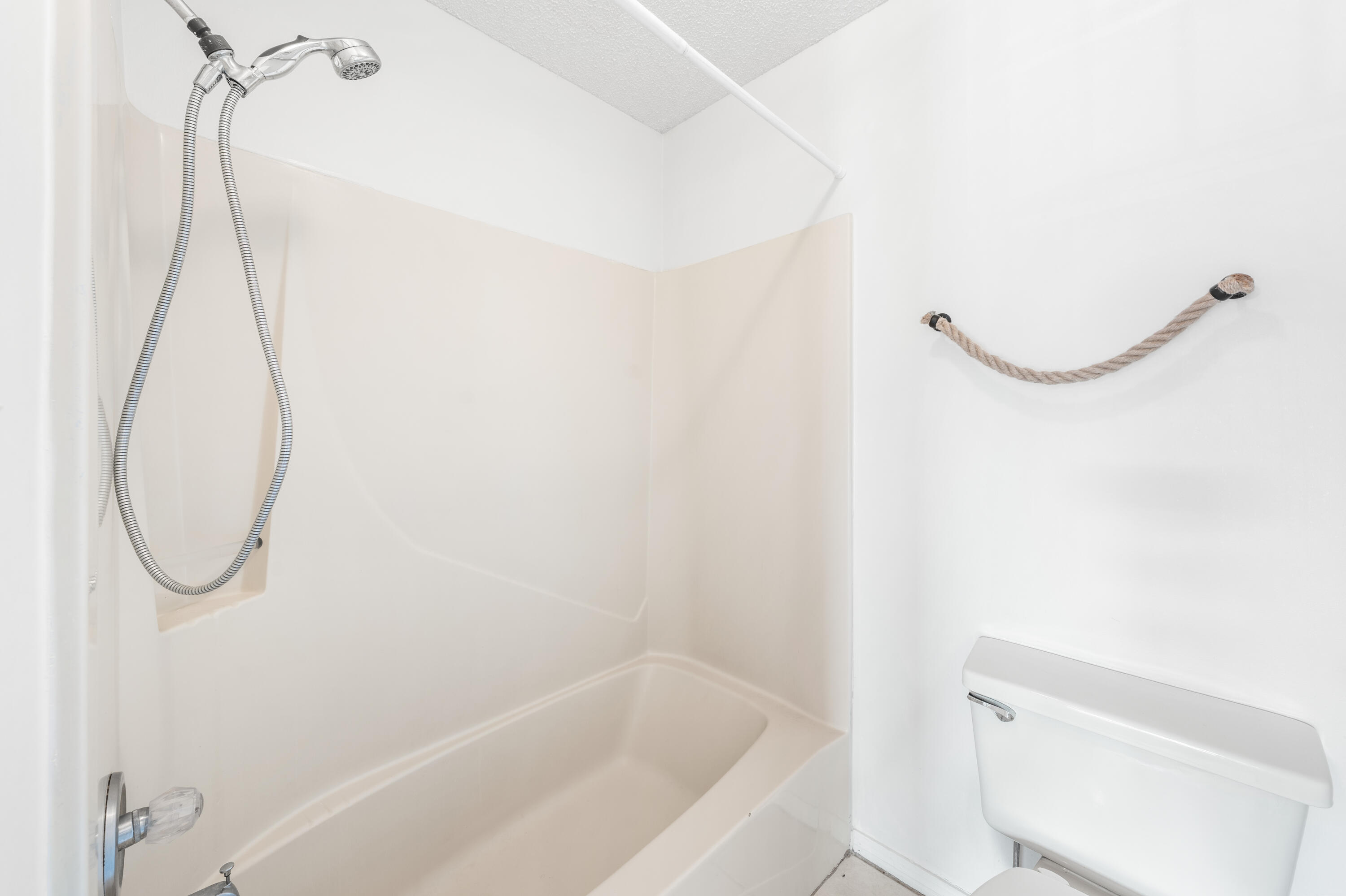 3654 East County Highway 30A, Unit 8B Santa Rosa Beach, FL 32459 - Photo 26 of 42 a bathroom with a bath tub and a shower